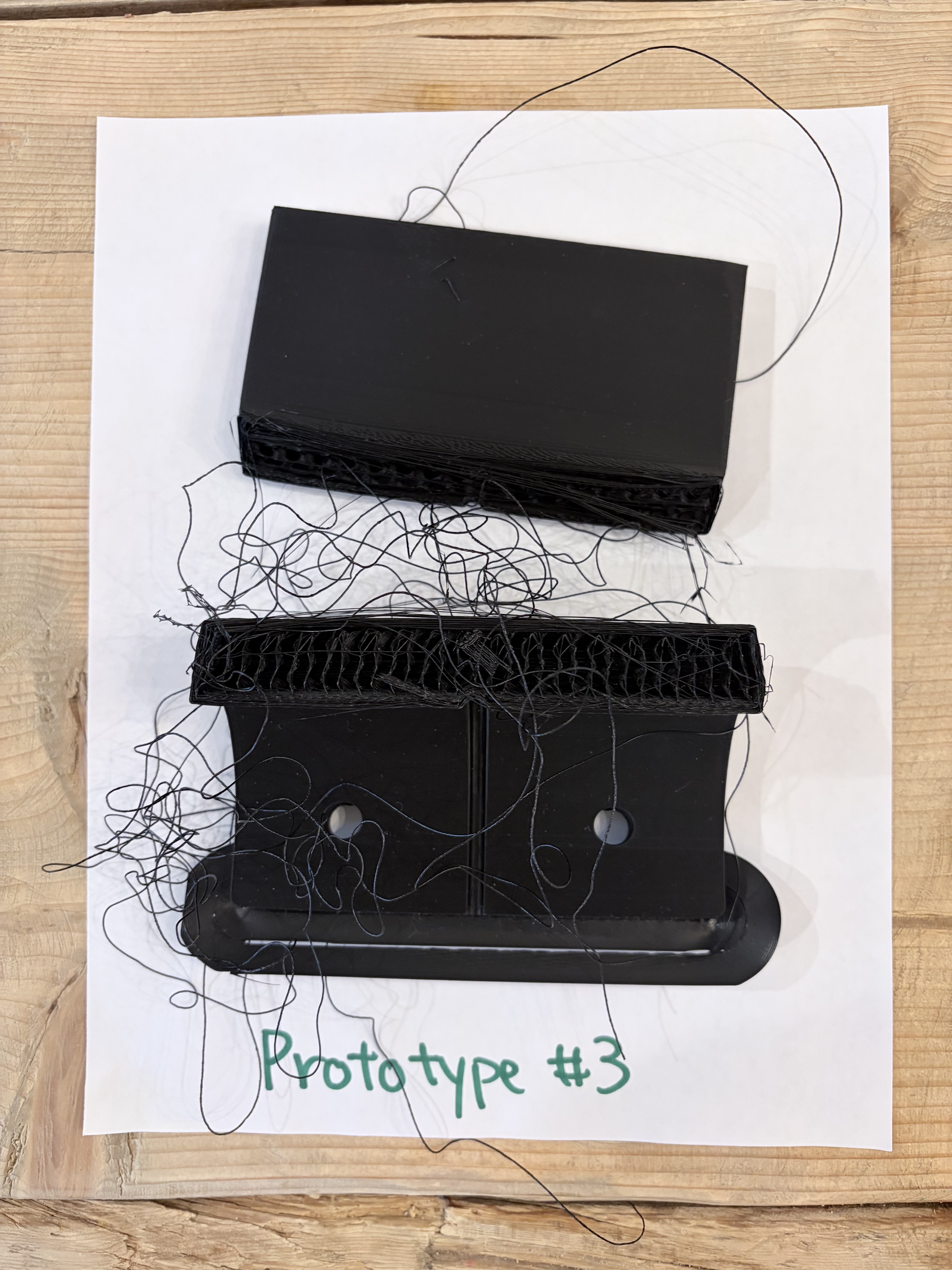 Prototype 3: a failed print covered in tangled spaghetti filament
